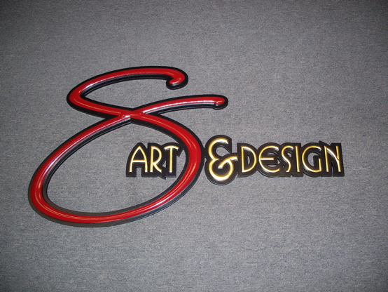 3d carved urathane letters with enamel paints and 23k gold.  

This set was shipped to Hawaii