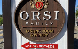 Round Wooden Sign with raised copy fo Orsi family winery