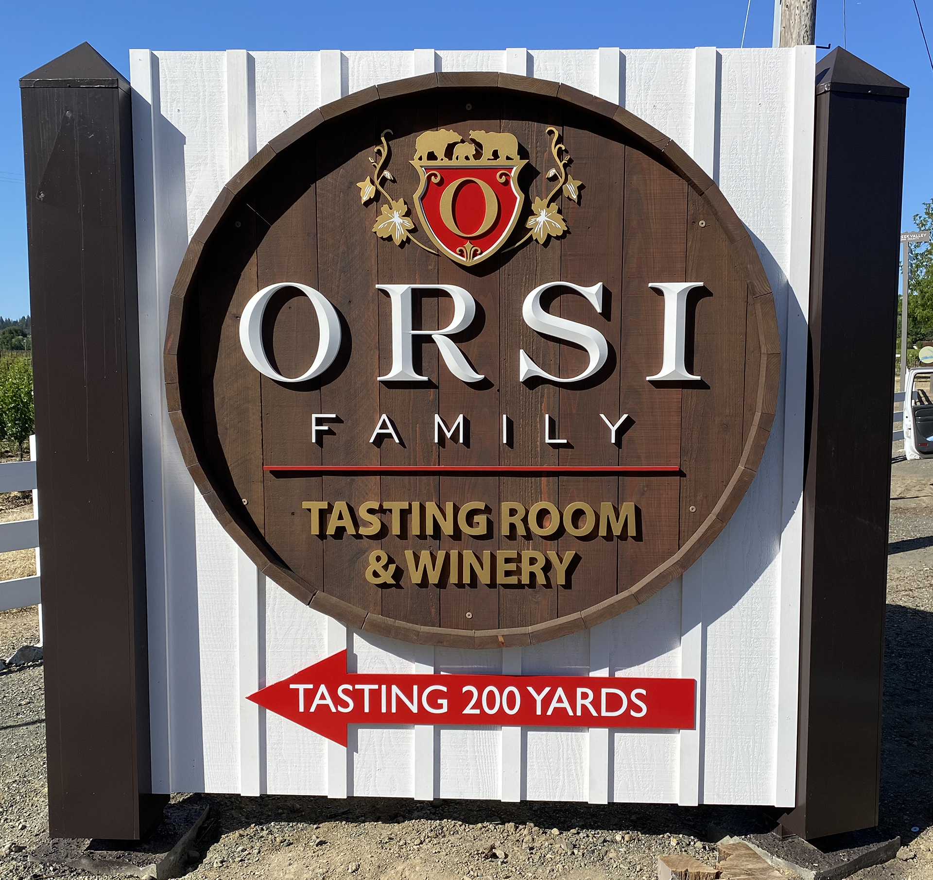 Round Wooden Sign with raised copy fo Orsi family winery