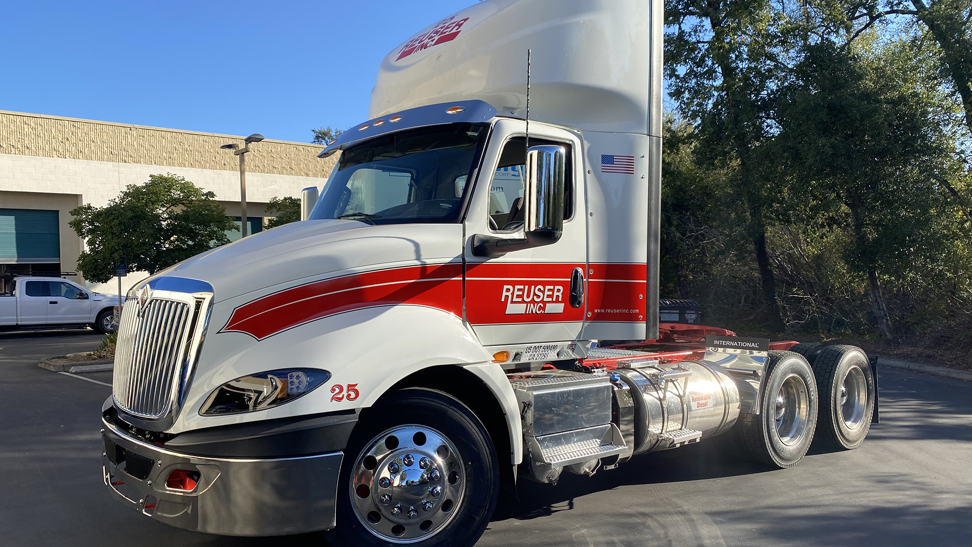 Peterbuilt truck with logo vinyl decals over red pinstriping