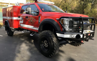 Red Fire Truck with gold & black vehicle graphics