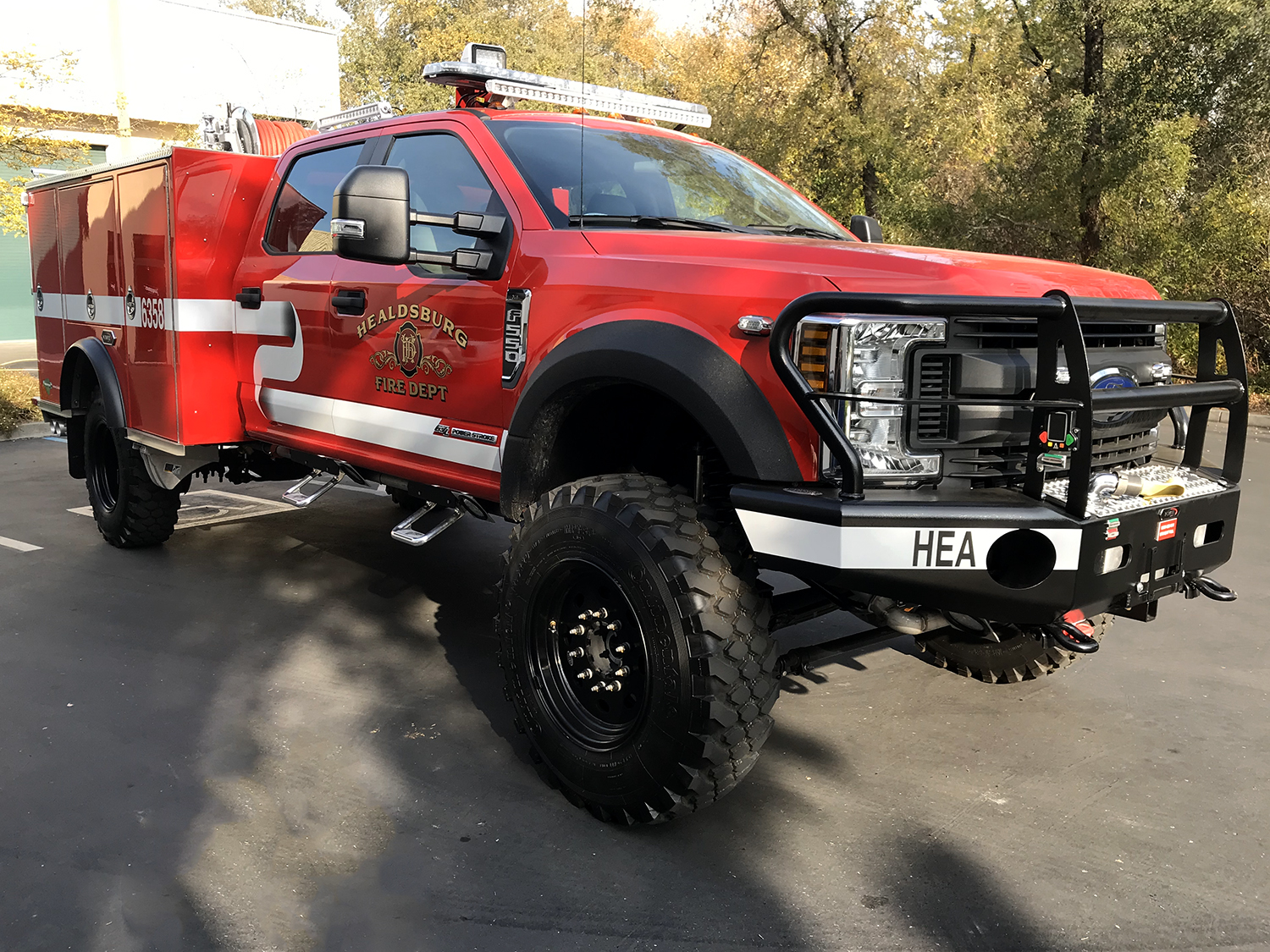 Red Fire Truck with gold & black vehicle graphics